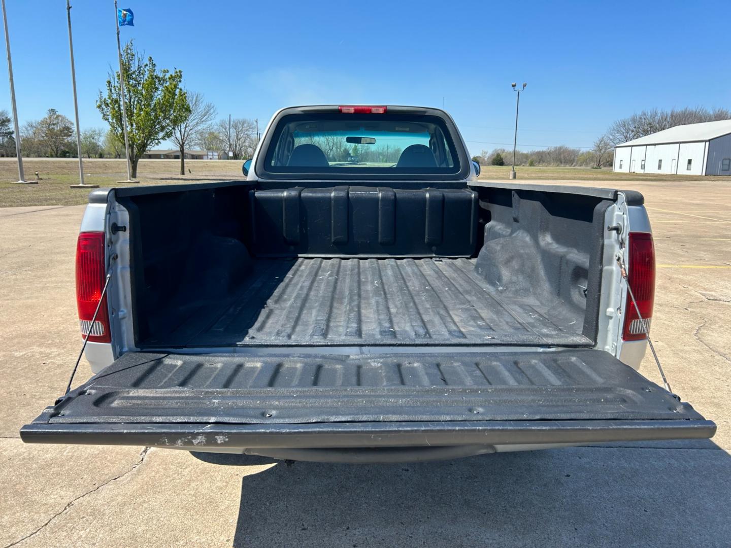 2003 GRAY /Gray Ford F-150 XL Long Bed 2WD (2FTPF17Z43C) with an 5.4L V8 SOHC 16V engine, AUTOMATIC transmission, located at 17760 Hwy 62, Morris, OK, 74445, (918) 733-4887, 35.609104, -95.877060 - 2003 FORD F-150 HAS THE 5.4 TRITON ENGINE AND IS 2WD. THIS TRUCK HAS MANUAL SEATS, MANUAL WINDOWS, MANUAL LOCKS, AMFM STEREO, CASSETTE PLAYER, BEDCOVER, ONLY 48,847 ACTUAL MILES!! CLEAN TITLE AND FREE CARFAX REPORT GOODYEAR 245/75R16 TIRES ***DOES HAVE SOME RUST AND PAINT DAMAGE AS SHOWN IN THE PI - Photo#11